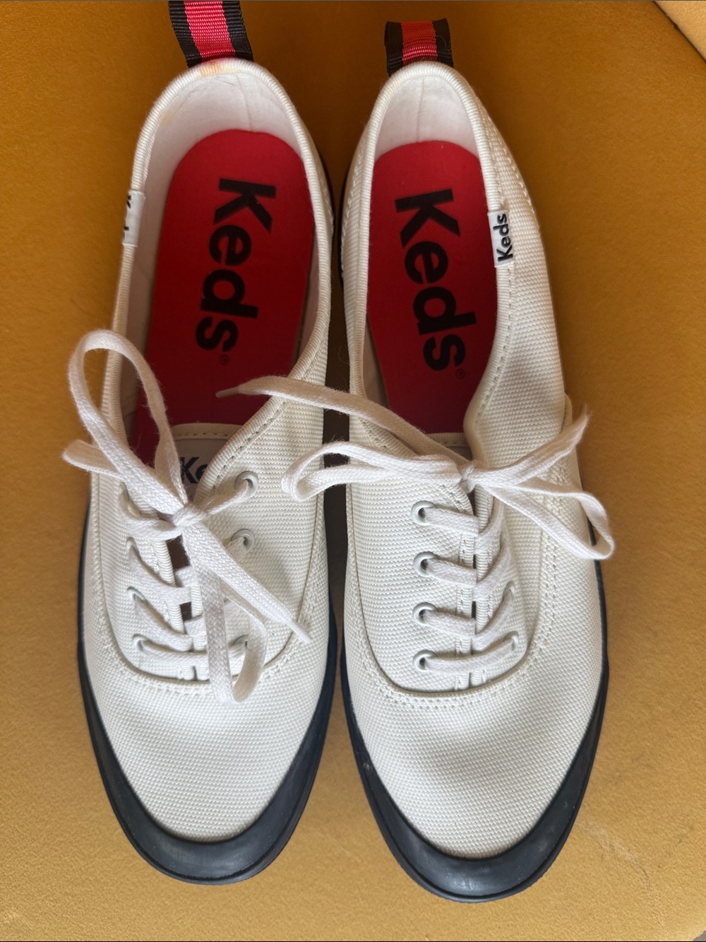 Keds Women’s White Canvas Low-Top Sneakers with Red Insole